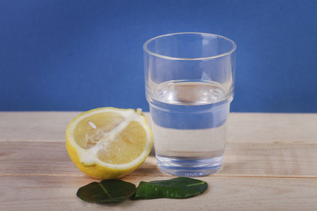 Lemon and lemongrass on wooden background. Healthy lifestyle. Detox.の写真素材