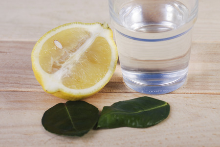 Lemon and lemongrass on wooden background. Healthy lifestyle. Detox.の写真素材