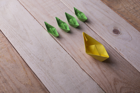 Leadership concept - Yellowpaper ship leader leading groupの写真素材