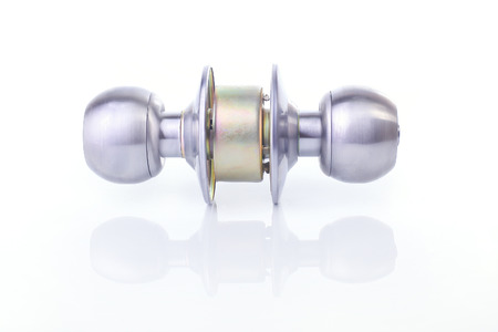 Close up of Stainless steel round ball door knob components isolated white background as Locksmith concept.の写真素材