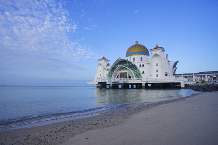 Majestic view of Malacca Straits Mosque during blue hourの写真素材