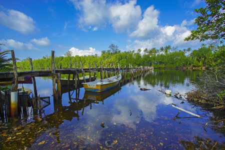 Old broken abandoned fisherman jetty / pier made from wood.の写真素材