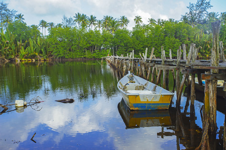 Old broken abandoned fisherman jetty / pier made from wood.の写真素材
