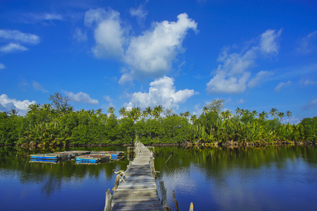 Old broken abandoned fisherman jetty / pier made from wood.の写真素材