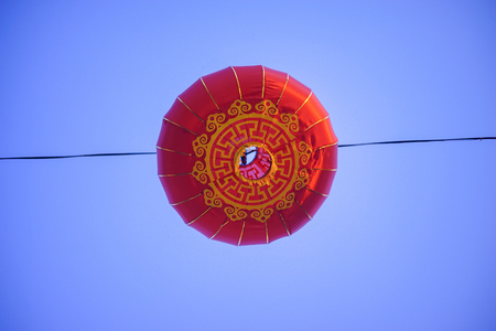 Beautiful Chinese new year red color lanterns during blue hourの写真素材