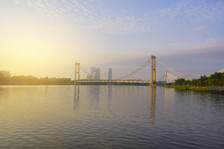 Unfinished underconstruction bridge for train usage in putrajaya during sunriseの写真素材