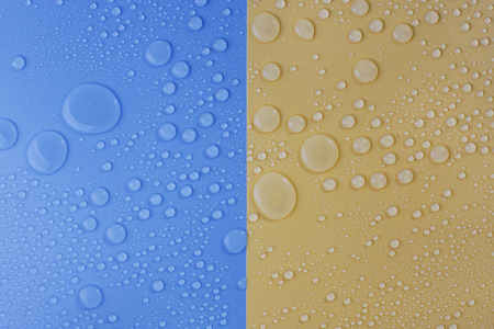Water Drops on blue and yellow backgroundの写真素材