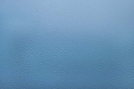 Water Drops on blue backgroundの写真素材