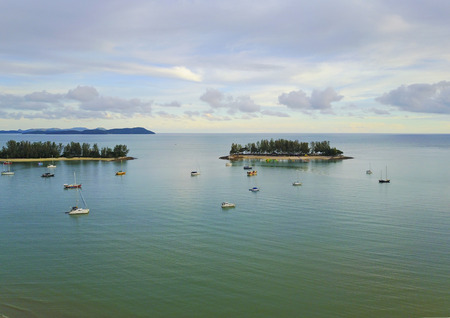 Aerial view of a Lighthouse, boat and yacht docked in marina, Langkawiの写真素材
