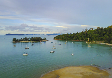 Aerial view of a Lighthouse, boat and yacht  docked in marina, Langkawiの写真素材