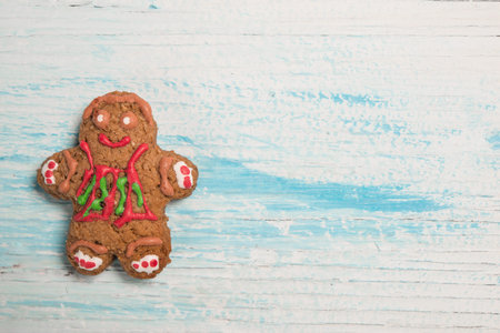 Gingerman over light wood