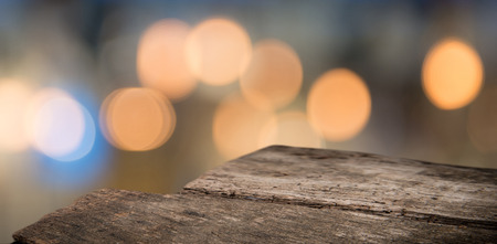 Produsct display montage over blurred city lights, holiday backgroundの写真素材