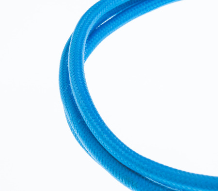 Close up of blue cable on white backgroundの写真素材