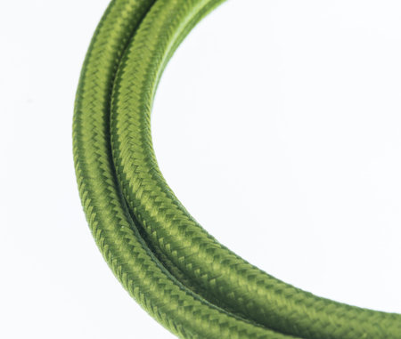 Closeup of green electric cable isolated on white