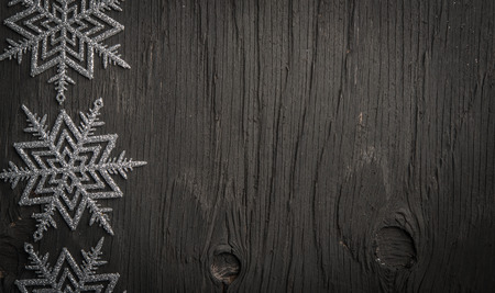 Snowflake border with black background, winter timeの写真素材