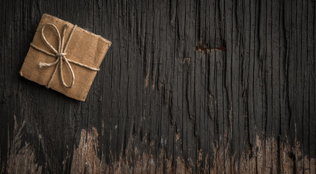 Vintage handmade small gift box for Christmas and copy spaceの写真素材