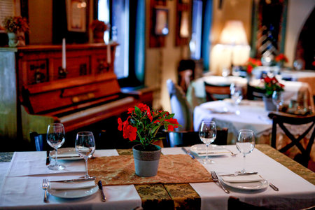 Close up of setting table in restaurant and piano is backの写真素材