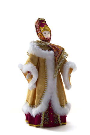 costume doll - a merchant woman in winter clothes on a white background  view - 2 3 on the rightの写真素材