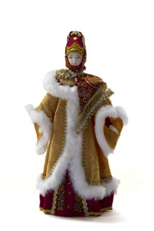 costume doll - a merchant woman in winter clothes on a white background の写真素材