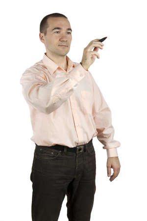 Man in casual clothes writes / draws a marker (on white background)の写真素材