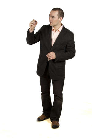 man in a suit with a marker on a white backgroundの写真素材