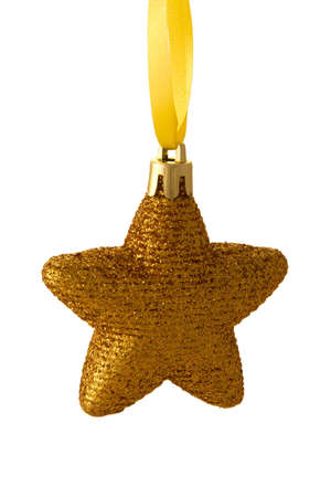 Christmas decoration - golden star on a yellow ribbon. isolated objectの写真素材