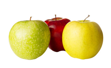 green, yellow and red apples on a white backgroundの写真素材