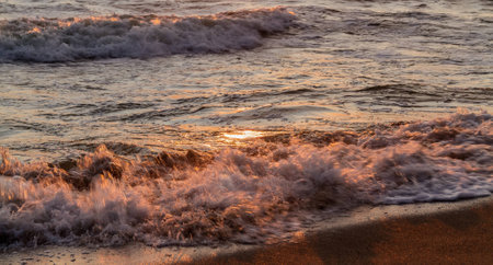 waves in the Baltic Sea sea ââat sunset, Lithuaniaの写真素材