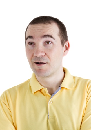 surprised man looking up on white backgroundの写真素材