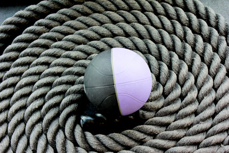 coiled workout ropes with a medicine ball