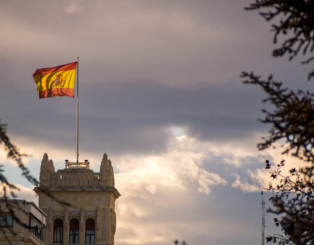 Spanish flag on the top of a buildingのeditorial素材