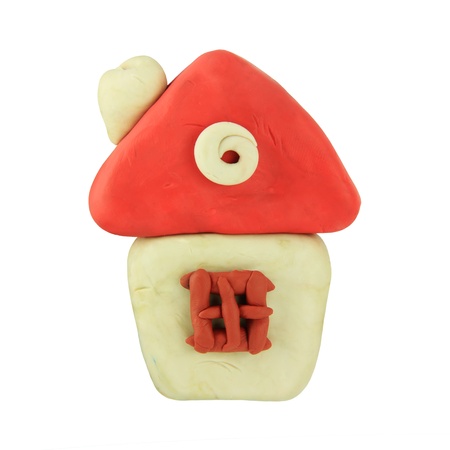 isolated child hand made house sculptureの写真素材