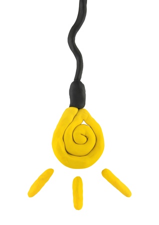 plasticine  child hand made isolated bulb on the whiteの写真素材