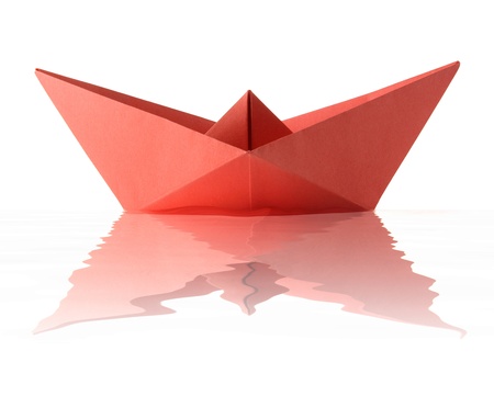 Paper origami red boat on the white backgroundの写真素材