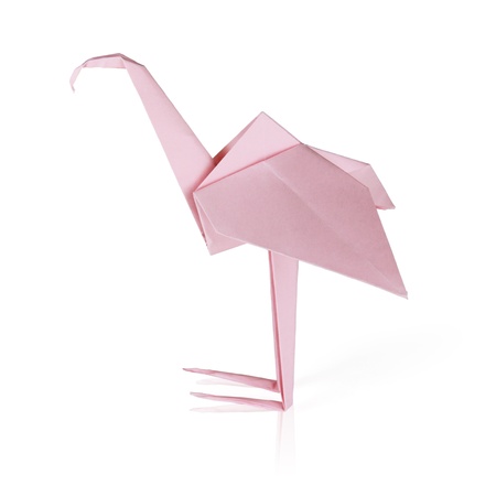 Origami pink paper flamingo on a white backgroundの写真素材