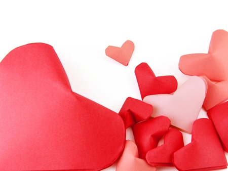 Red paper isolated hearts on a white backgroundの写真素材