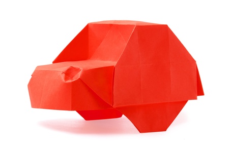 Origami red isolated cartoon car on a white backgroundの写真素材