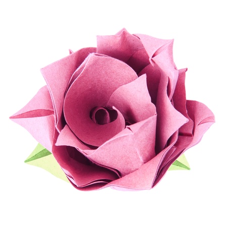 Origami paper pink vintage stile isolated rose on a white backgroundの写真素材