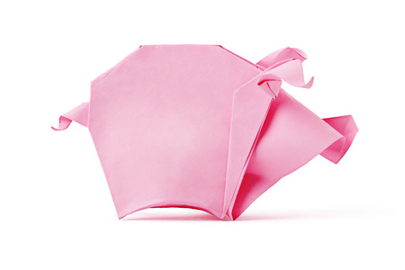 Origami pink business money saving pig symbol on a white backgroundの写真素材