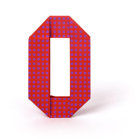 Origami paper isolated education mathematics number zero with print on a white backgroundの写真素材