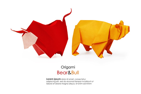 Bear and bull origami paper business analising market on a white backgroundの写真素材