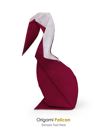 Origami paper pelican on a white backgroundの写真素材