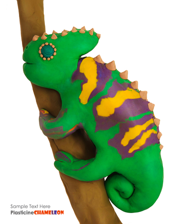 Plasticine cartoon chameleon on a branch on a white backgroundの写真素材