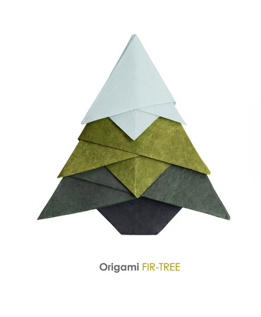 Paper origami holiday winter christmas fir-tree in snow on a white backgroundの写真素材
