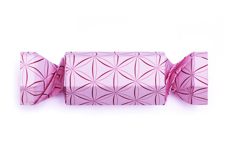 Origami pink sweet holiday geometric candy on a white backgroundの写真素材