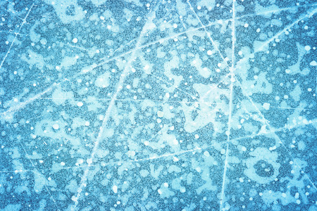 Textured ice blue frozen rink winter backgroundの写真素材