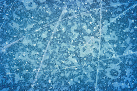 Textured ice blue frozen rink winter backgroundの写真素材