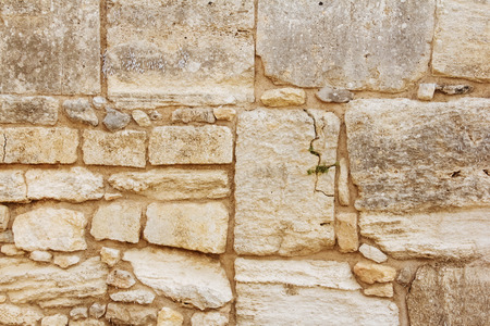 Ancient dirty stone wall  old greece building Knossos palace backgroundの写真素材