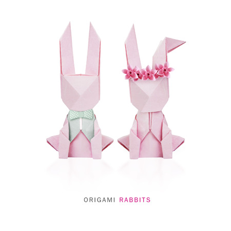 Easter origami rabbits love couple on a white backgroundの写真素材