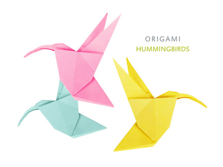 Origami art hummingbirds flying birds on white backgroundの写真素材
